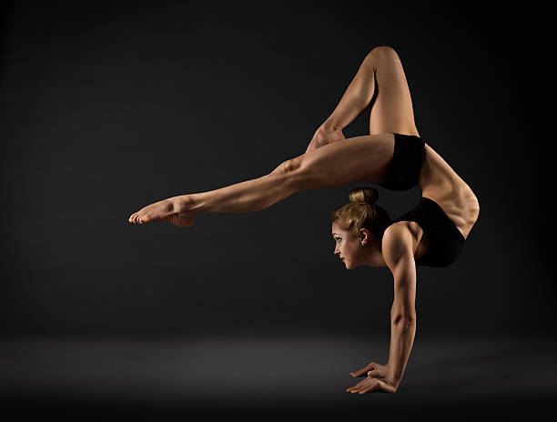 istock Acrobat Performer, Circus Woman Hand Stand, Gymnastics Back Bend Pose 473976532