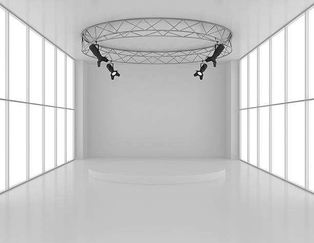 istock Empty room with spotlights on top and pedestal 473976714