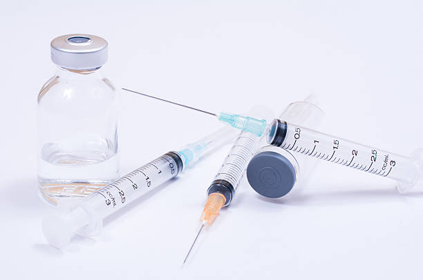 istock Syringe with droplet and medical on white background. 473984708