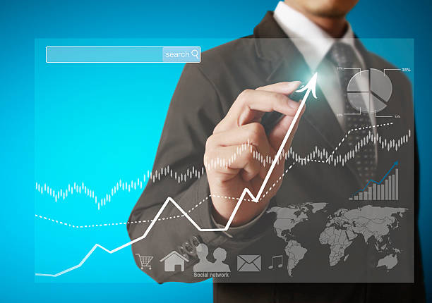 istock businessman hand writing  business graph 473998714