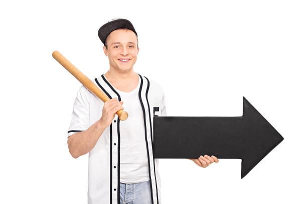 若い男性の保持野球のバット、矢印 - baseball baseball bat bat isolated ストックフォトと画像