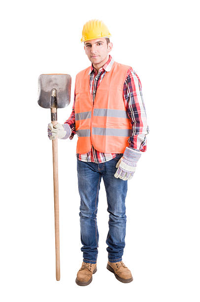 istock Builder with helmet, vest, gloves and shovel 474005926