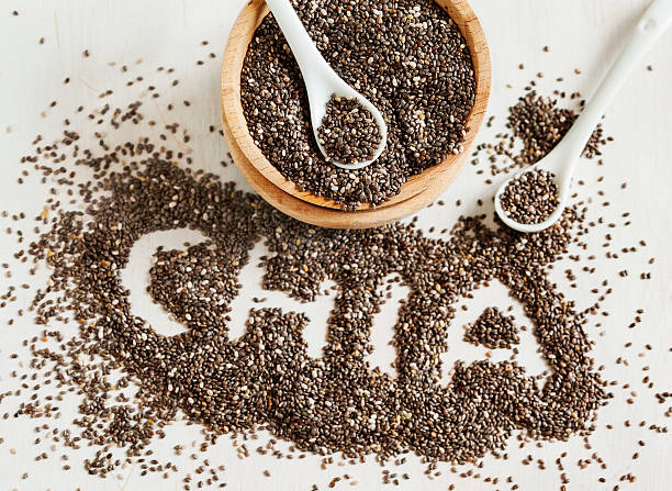 feita a partir de sementes de chia palavra. - chia seed spoon food imagens e fotografias de stock