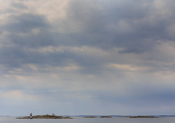 istock Dramatic sky over islets in Swedish Stockholm archipelago 474008378