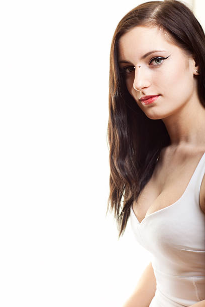 istock Attractive Woman At Bright Window 474008604