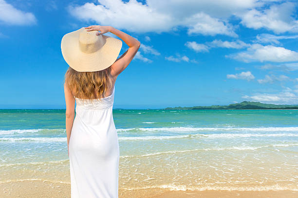 istock Woman looking on the sea 474008752