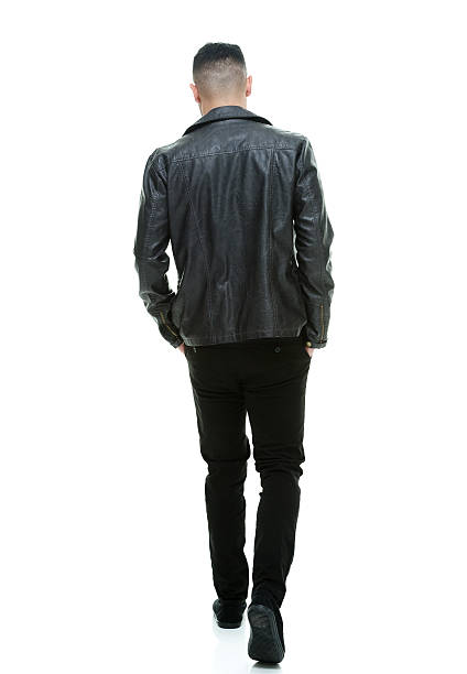istock Rear view of casual man walking 474009772