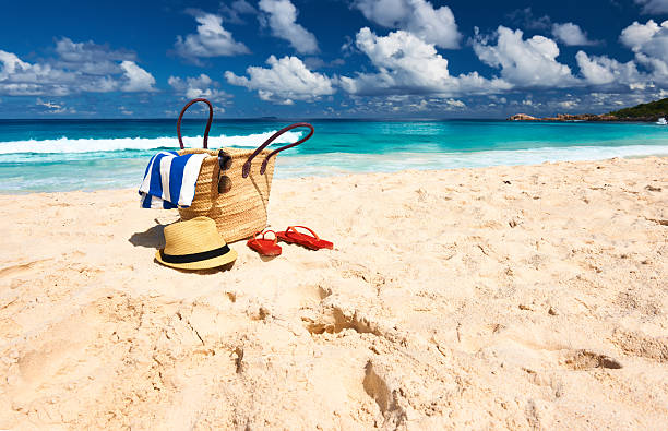 Christmas gift box in the ocean - holiday concept