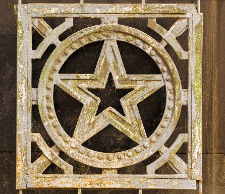 Aged soviet Russian Star in wrought iron with flakes and signs of age