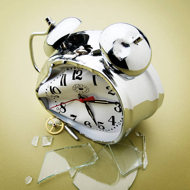 istock Broken alarm clock with no people. 474014310