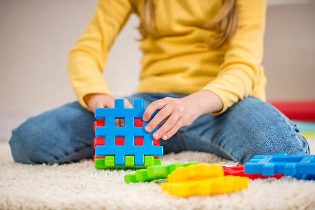 istock Girl with toy 474017316