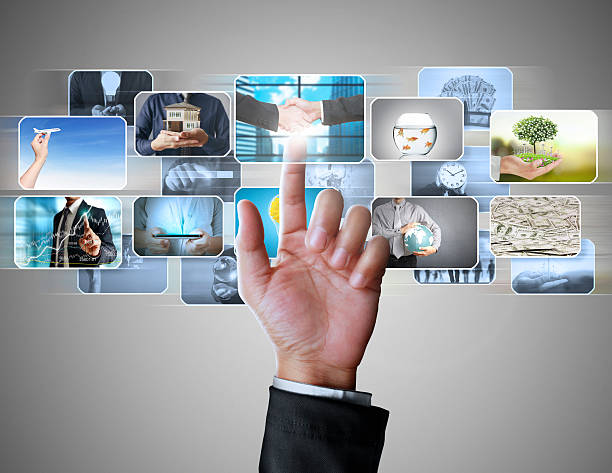 istock businessmen and Reaching images streaming 474017644