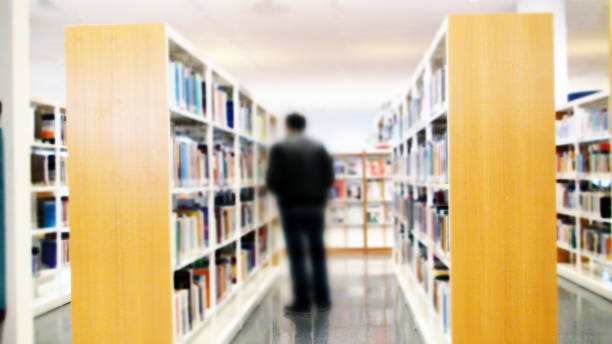 istock Looking For Books in Library 474038750