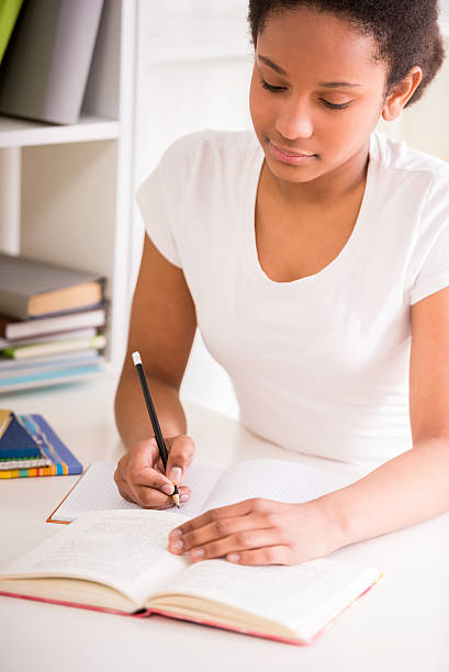 istock Schoolgirl at home 474039078