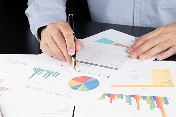 istock Man Analysis Business and financial report. 474042564