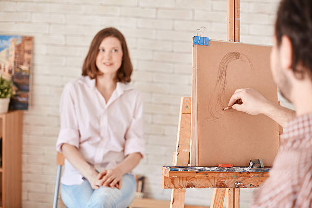 写真の女性 - women artist painting easel ストックフォトと画像