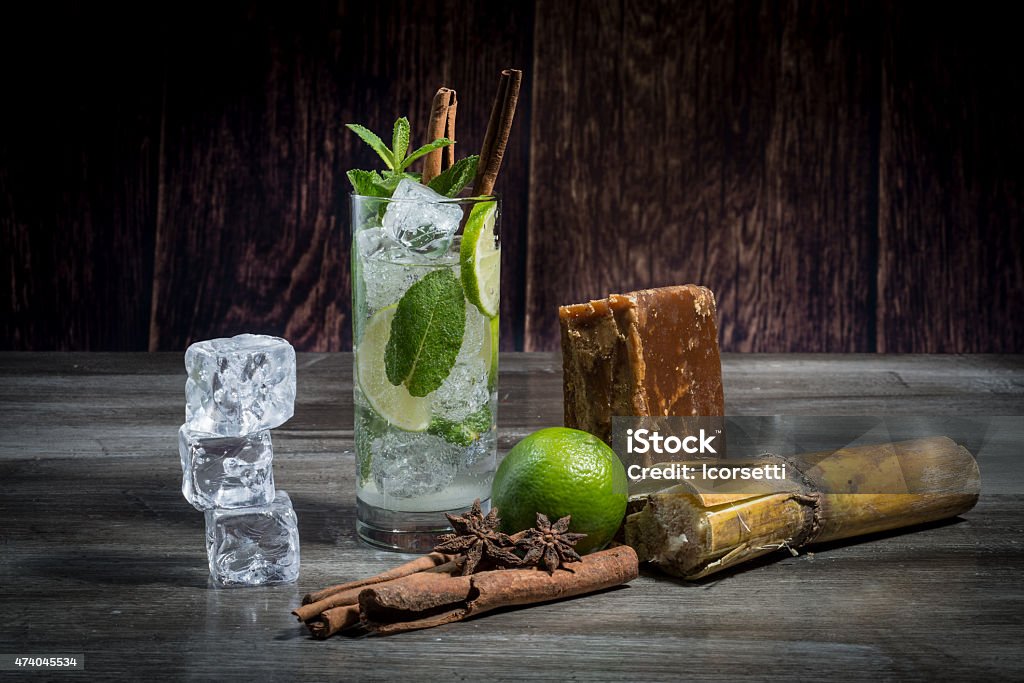 Mojito fresh mojito in a transparent glass on wooden background Rum Stock Photo