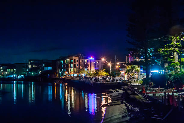 Night Lights Of Caloundra The lights of the beach restaurants reflect beautifully on the still surface of the ocean at Caloundra, Queensland, Australia. This was the favourite place for the locals to have their dinner. Can't blame them. caloundra stock pictures, royalty-free photos & images