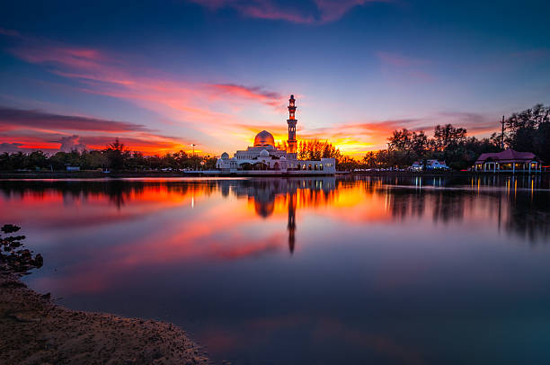 istock Red sunset at the lake near the mosque 474051214