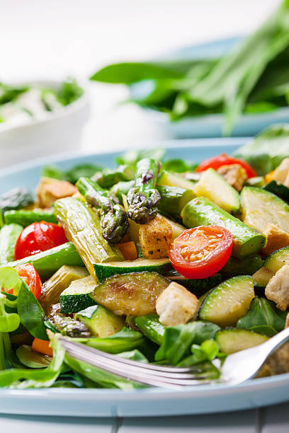 istock Salad with grilled green asparagus 474051228