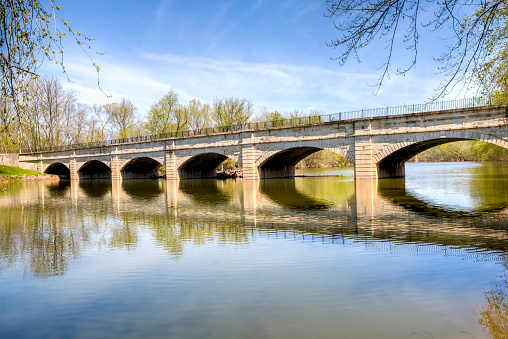 A High Dynamic Range photo of the Monocacy River Aqueduct in Frederick Maryland on a beautiful spring morning.  This aqueduct carries the Chesapeake and Ohio Canal over the Monocacy River.  The aqueduct was built in 1833 and is one of eleven aqueducts for the canal as it runs from Georgetown, DC to Cumberland Maryland.