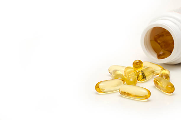 kapsułka - vitamin pill nutritional supplement capsule lecithin zdjęcia i obrazy z banku zdjęć