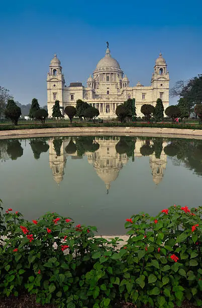 Photo of Victoria Memorial, Kolkata , India - reflection on water.