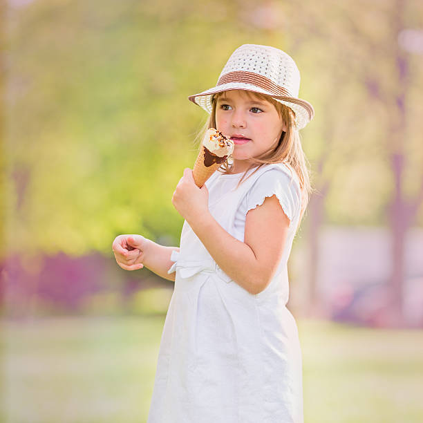 istock Little girl with ice cream 474057180