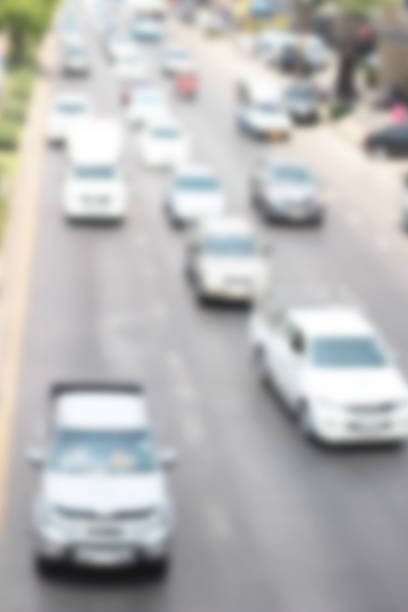 istock blurred of car on road 474057306