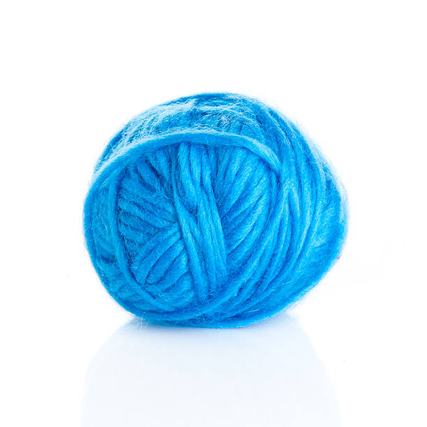 istock Blue Ball of knitting yarn on a white background 474057317