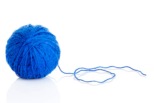 istock Blue Ball of knitting yarn on a white background 474057381