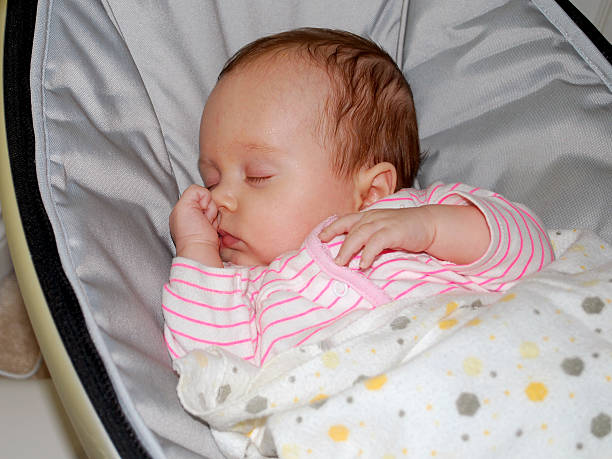 istock Newborn baby girl sleeping 474063334