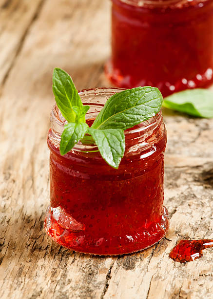 istock Delicious homemade strawberry jam in a jar, selective focus 474068444