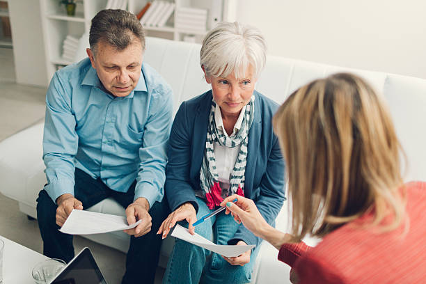 Mature Couple Meeting with Financial Advisor.