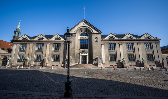 Copenhagen University main building in Frue Plads, Copenhagen, Denmark. Copenhagen University was established in 1479 under King Christian 1. The main building dates from the first half of the 19th century. 