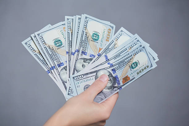 istock Money in female hands 474068940