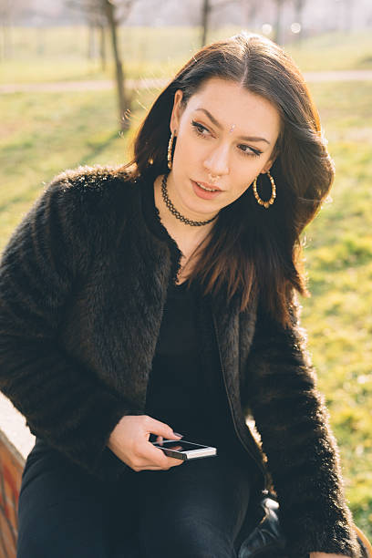 istock young beautiful woman using tablet and smartphone 474069354