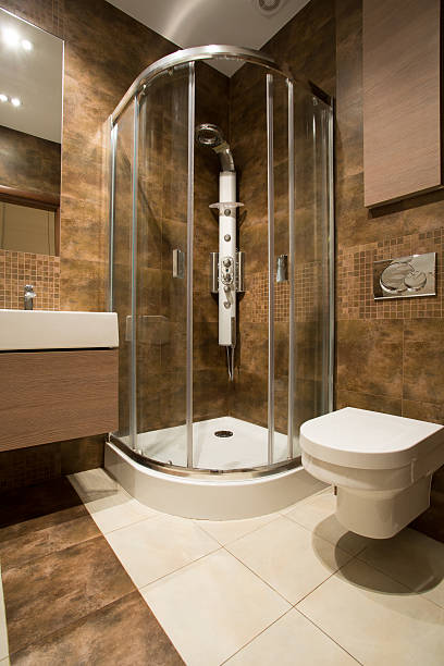 istock Glass douche and ceramic toilet 474070050