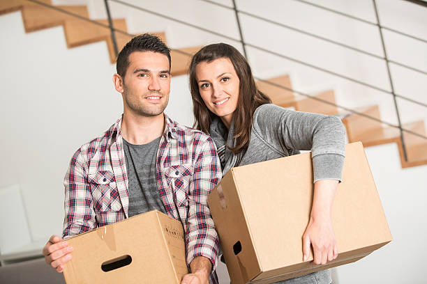istock young adults moving in new home 474070868