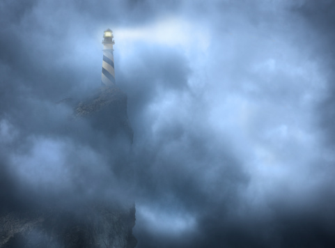 A lighthouse in the fog