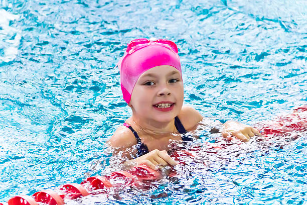 istock Cute girl in pink hat 474073382