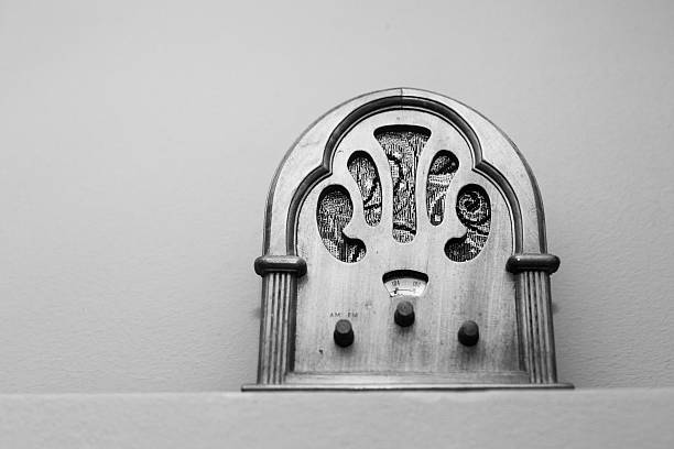 Vintage Radio Black and white close up of a vintage radio. vintage portable silver radio stock pictures, royalty-free photos & images