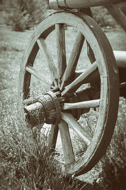 istock Wooden cart wheel 474074774