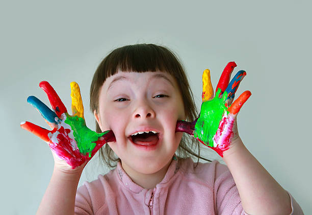istock Cute little girl with painted hands 474077834