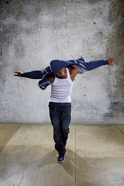 istock Hooded Urban Dancer Balancing 474079364