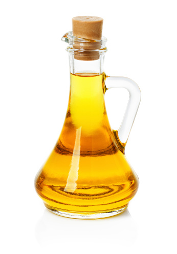jar, decanter with olive or sunflower oil isolated on the white background