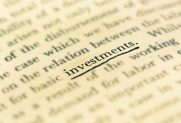 istock Focus investment word in vintage text book 474083358