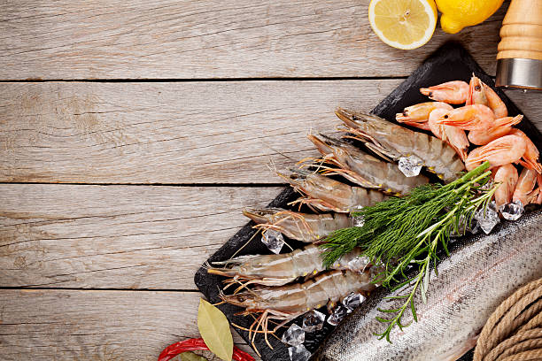 istock Fresh raw sea food with spices 474083684