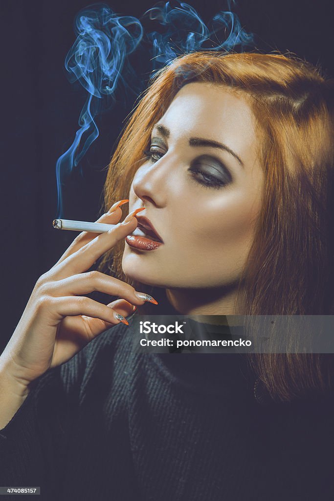 Smoking Red Hair Woman In Studio Stock Photo - Download Image Now - Adult,  Adults Only, Anger - iStock