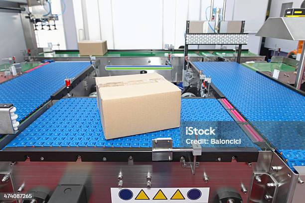 Conveyor Systems Stock Photo - Download Image Now - Automated, Box - Container, Cardboard